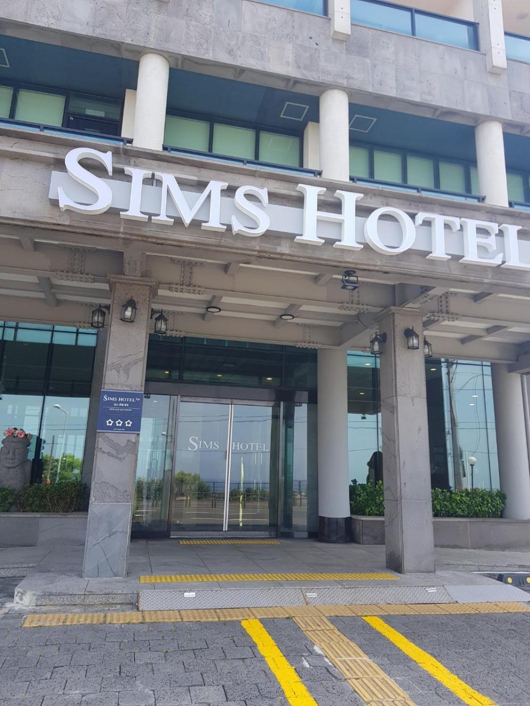 Sims Hotel Jeju Esterno foto